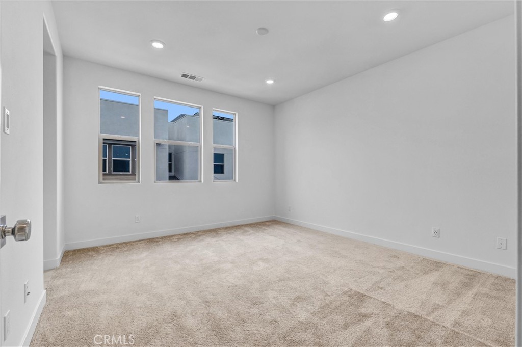 1808 Hollyleaf Terrace Montebello, CA 90640 - Photo 28 of 56 an empty room with windows