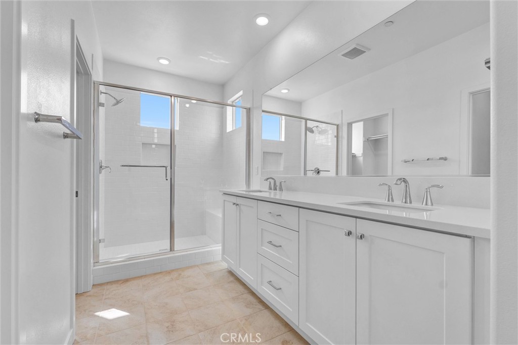 1808 Hollyleaf Terrace Montebello, CA 90640 - Photo 30 of 56 a bathroom with a granite countertop sink mirror and double
