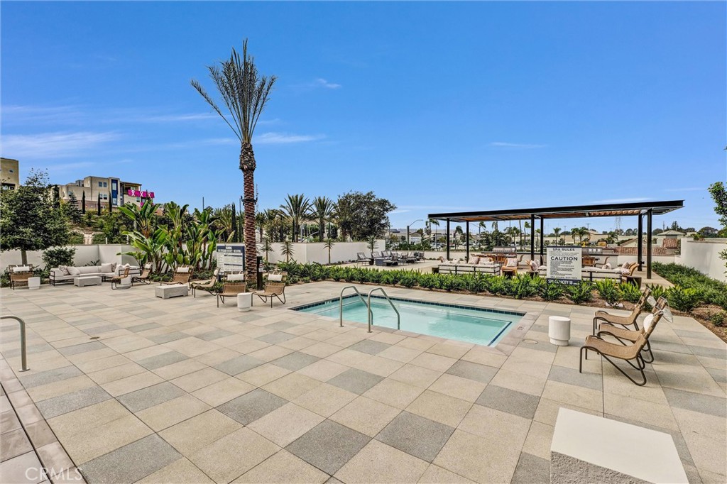 1808 Hollyleaf Terrace Montebello, CA 90640 - Photo 37 of 56 a view of a swimming pool with a lounge chair