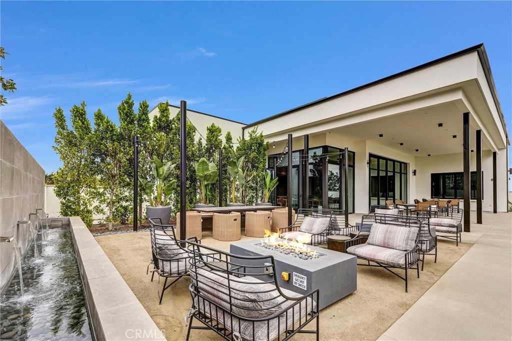 1808 Hollyleaf Terrace Montebello, CA 90640 - Photo 50 of 56 a view of a patio with couches table and chairs and potted plants