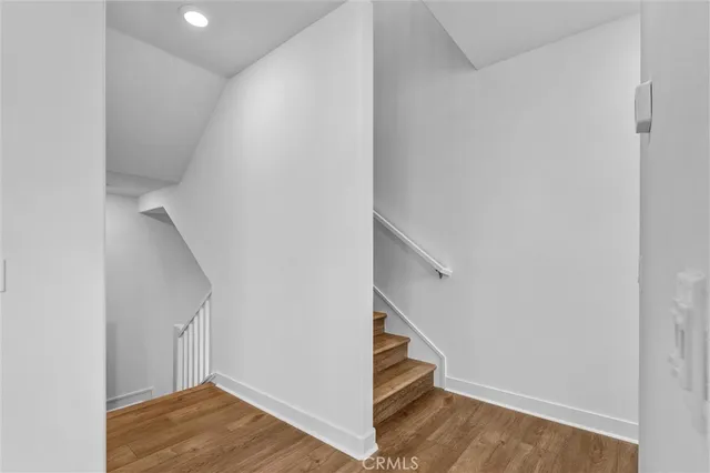 a view of entryway with wooden floor