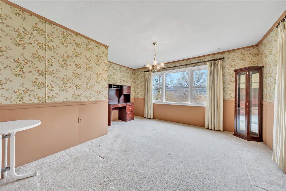 449 Cameron Drive Vinton, VA 24179 - Photo 11 of 39 an empty room with furniture and a fireplace