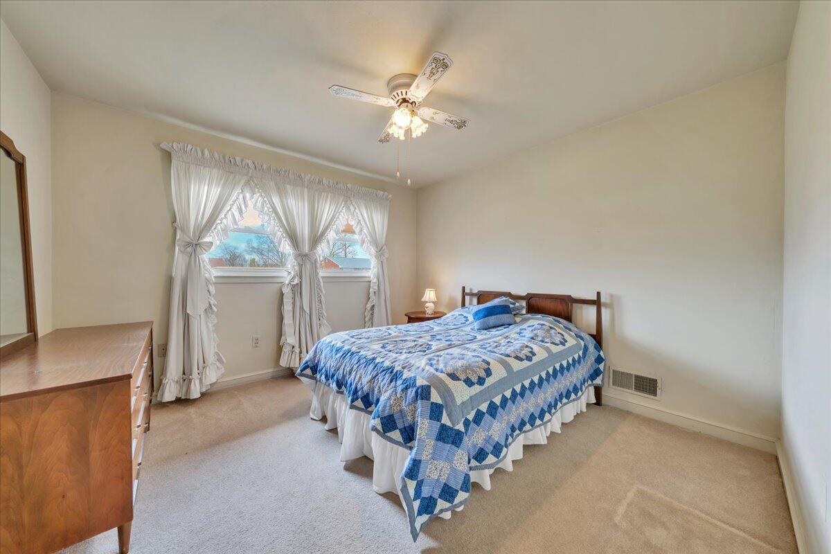 449 Cameron Drive Vinton, VA 24179 - Photo 20 of 39 a bedroom with a bed and window