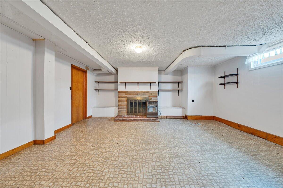 449 Cameron Drive Vinton, VA 24179 - Photo 26 of 39 a view of empty room with a fireplace