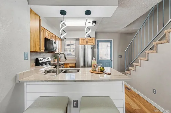 a view of room with a sink furniture and chandelier