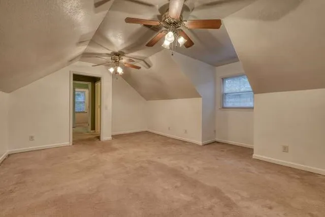 a view of a wooden roof deck
