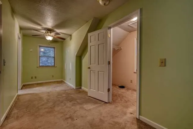 a view of a house with a roof deck