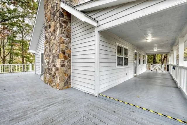 a view of a house with a yard and garage