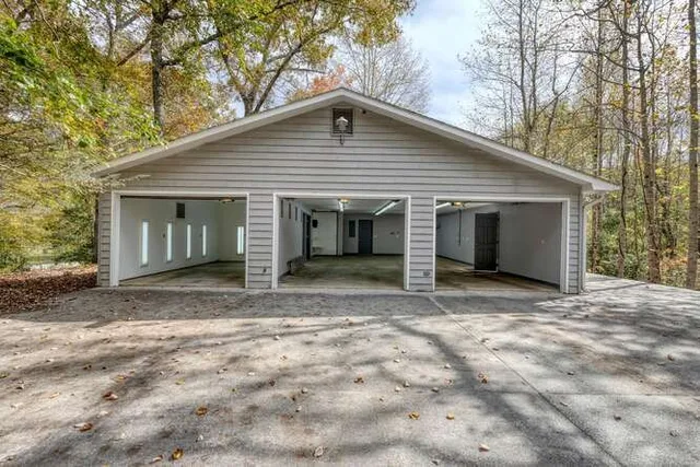 a backyard of a house with lots of green space