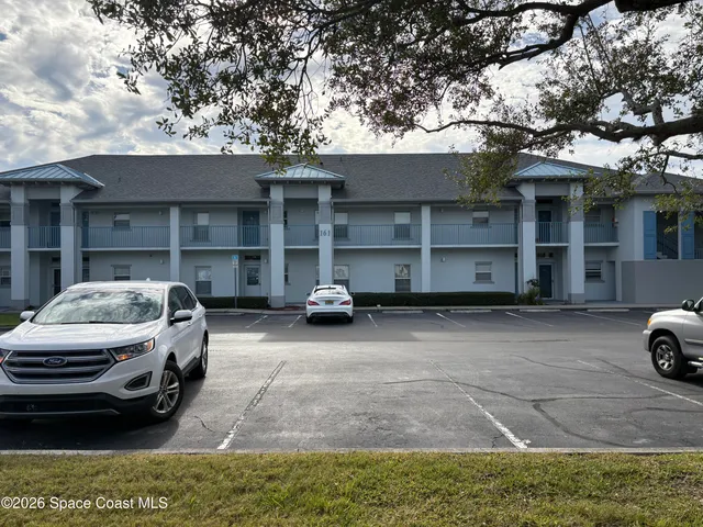 a car parked in front of a house