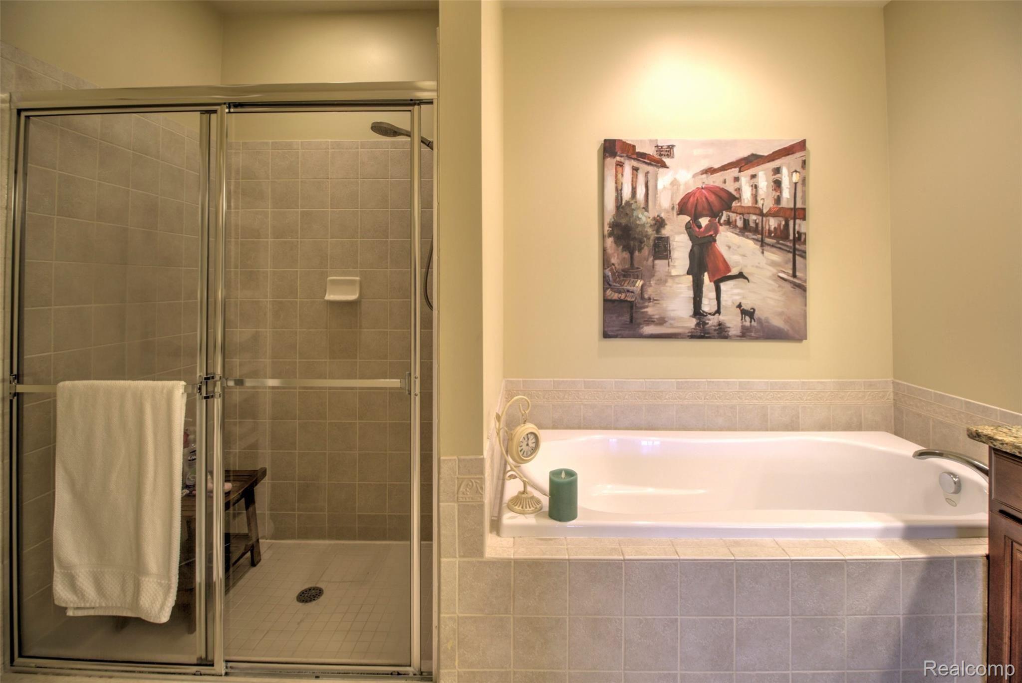 26548 Valhalla Drive, Unit 7 Farmington, MI 48331 - Photo 15 of 30 Master Bath Features a Large Walk-In Shower & Soaker Tub
