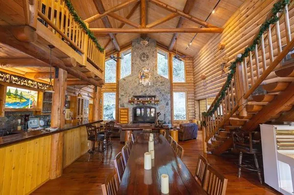 a view of a swimming pool with sitting area