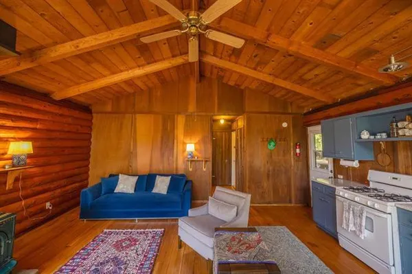 a rug sitting next to a bathroom