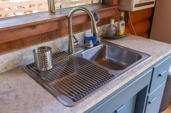 a view of a storage and utility room with a washer and dryer