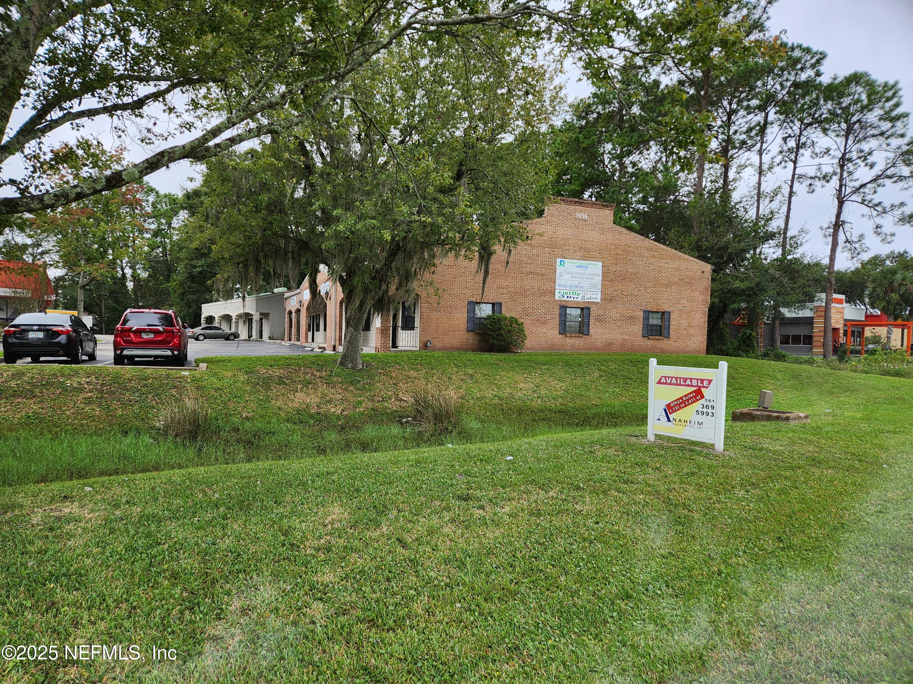 3938 Sunbeam Road Jacksonville, FL 32257 - Photo 27 of 28 a view of a house with a yard