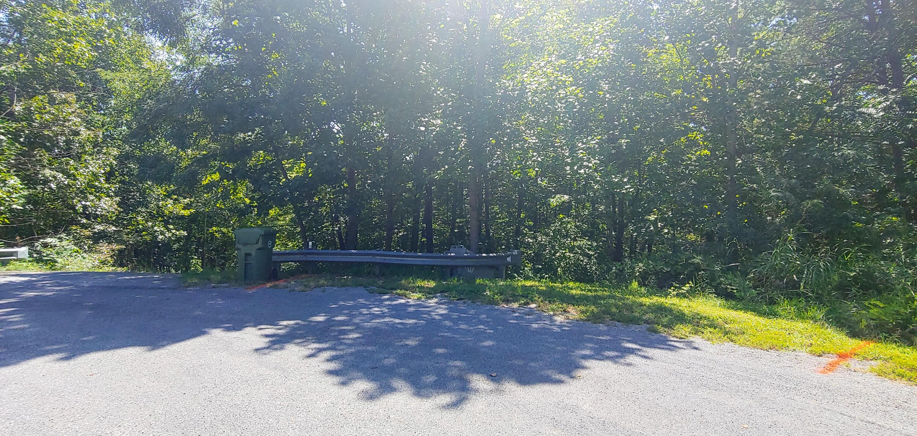 Lot 16 Moon Ridge Lane Goodview, VA 24095 - Photo 12 of 41 a view of a street with a bench