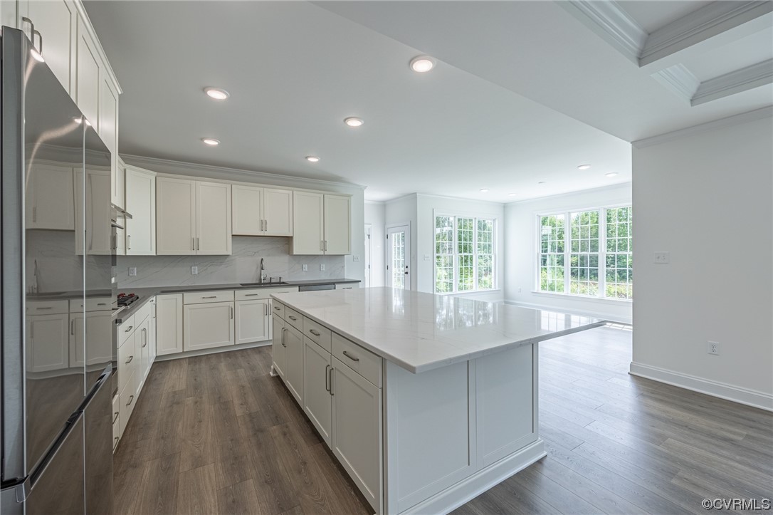 172 Blair Estates Richmond, VA 23222 - Photo 2 of 10 a kitchen with a sink microwave and cabinets