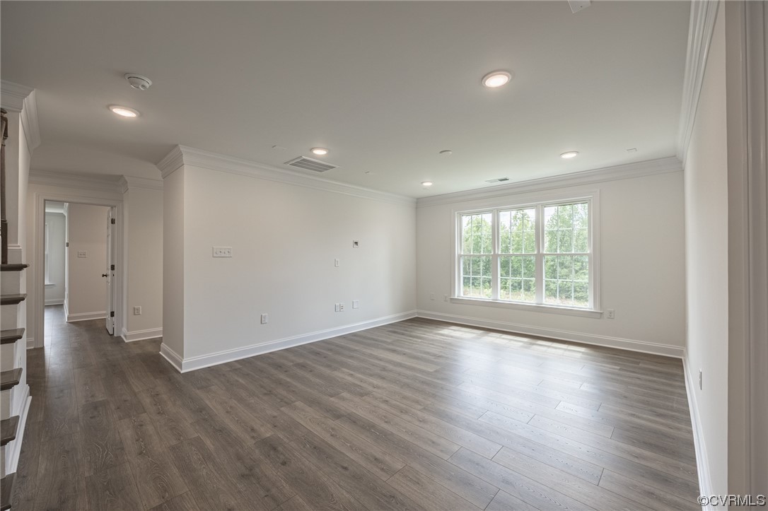 172 Blair Estates Richmond, VA 23222 - Photo 5 of 10 an empty room with wooden floor and windows