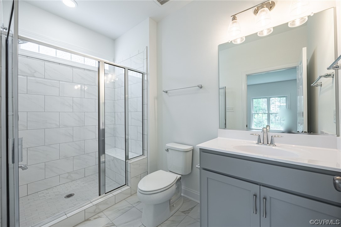 172 Blair Estates Richmond, VA 23222 - Photo 6 of 10 a bathroom with a sink a toilet and shower