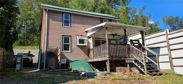 a front view of a house with garage