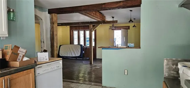 a en suite bathroom with a toilet sink and mirror