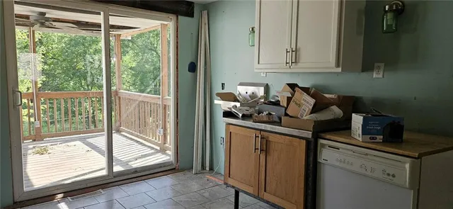 a kitchen with a sink and a window