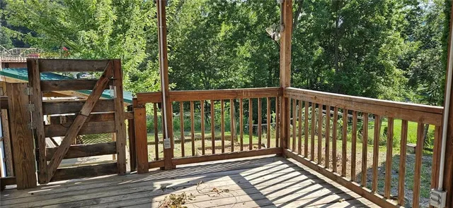 a view of a wooden street from a balcony