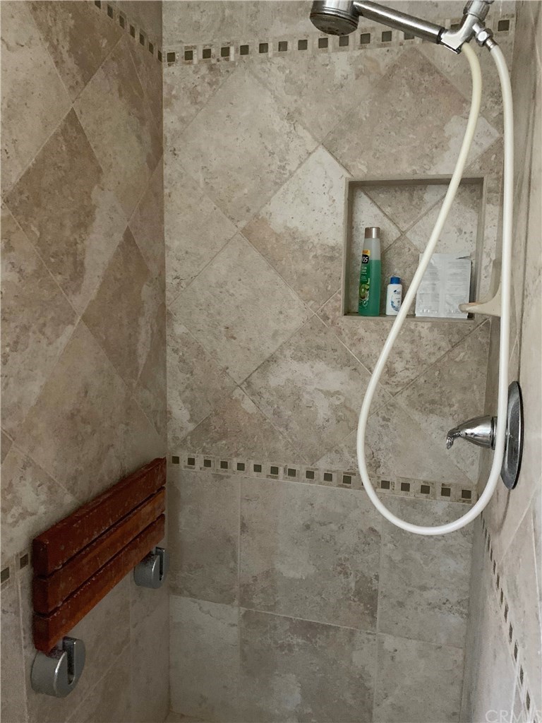273 Harvard Lane Seal Beach, CA 90740 - Photo 13 of 43 The Master Bathroom Shower has been Custom Tiled.