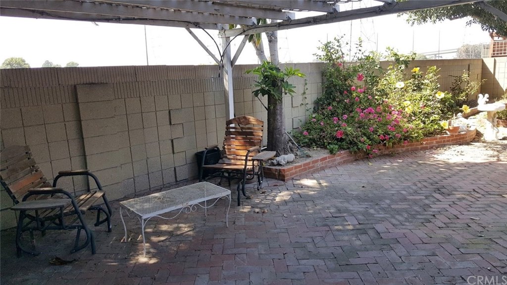 273 Harvard Lane Seal Beach, CA 90740 - Photo 21 of 43 Large area to barbecue, set up tables and chairs, invite family and friends over. Great entertaining backyard.