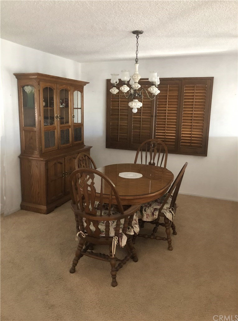 273 Harvard Lane Seal Beach, CA 90740 - Photo 6 of 43 Spacious Dining Room, open to family room and the kitchen.