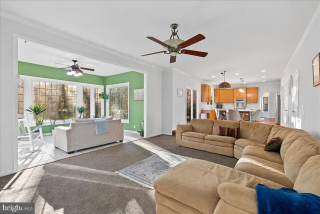 a bathroom with a granite countertop toilet sink and mirror