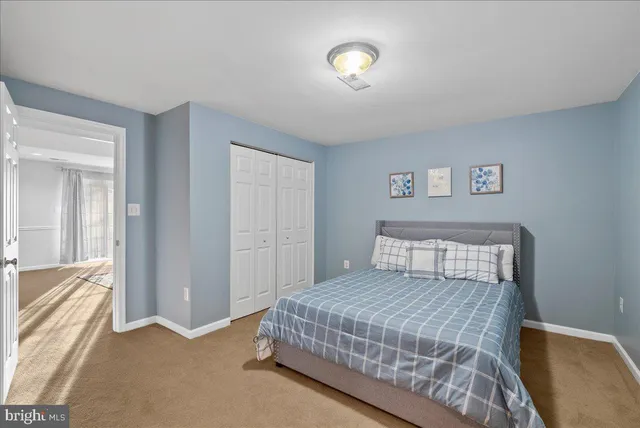a view of a patio with a table and chairs