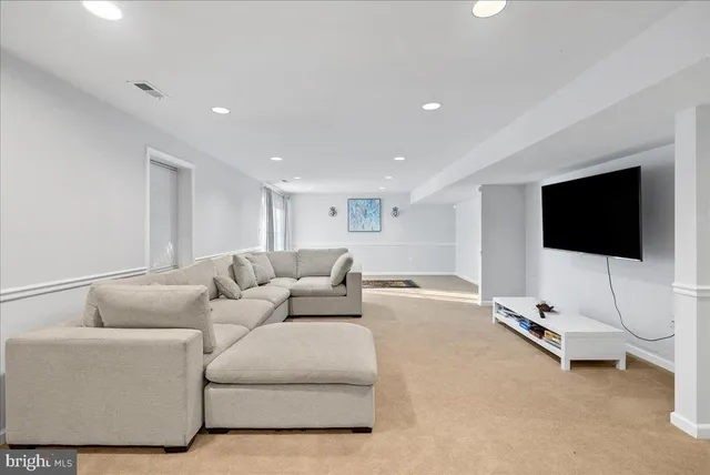 a view of a apartment with a large trees