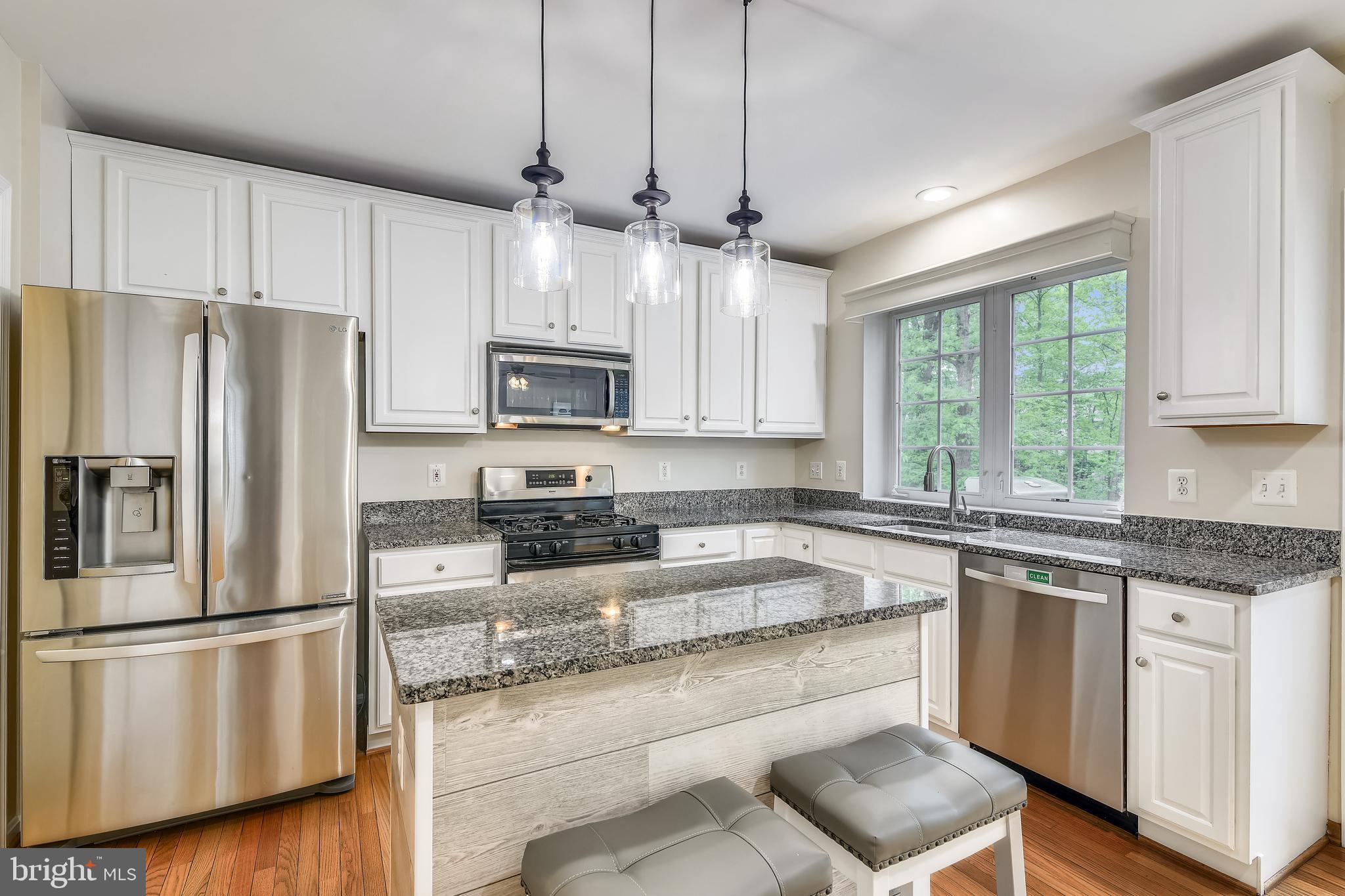 21558 Awbrey Place Broadlands, VA 20148 - Photo 10 of 45 UPDATED KITCHEN OFFERS STAINLESS APPLIANCE PKG