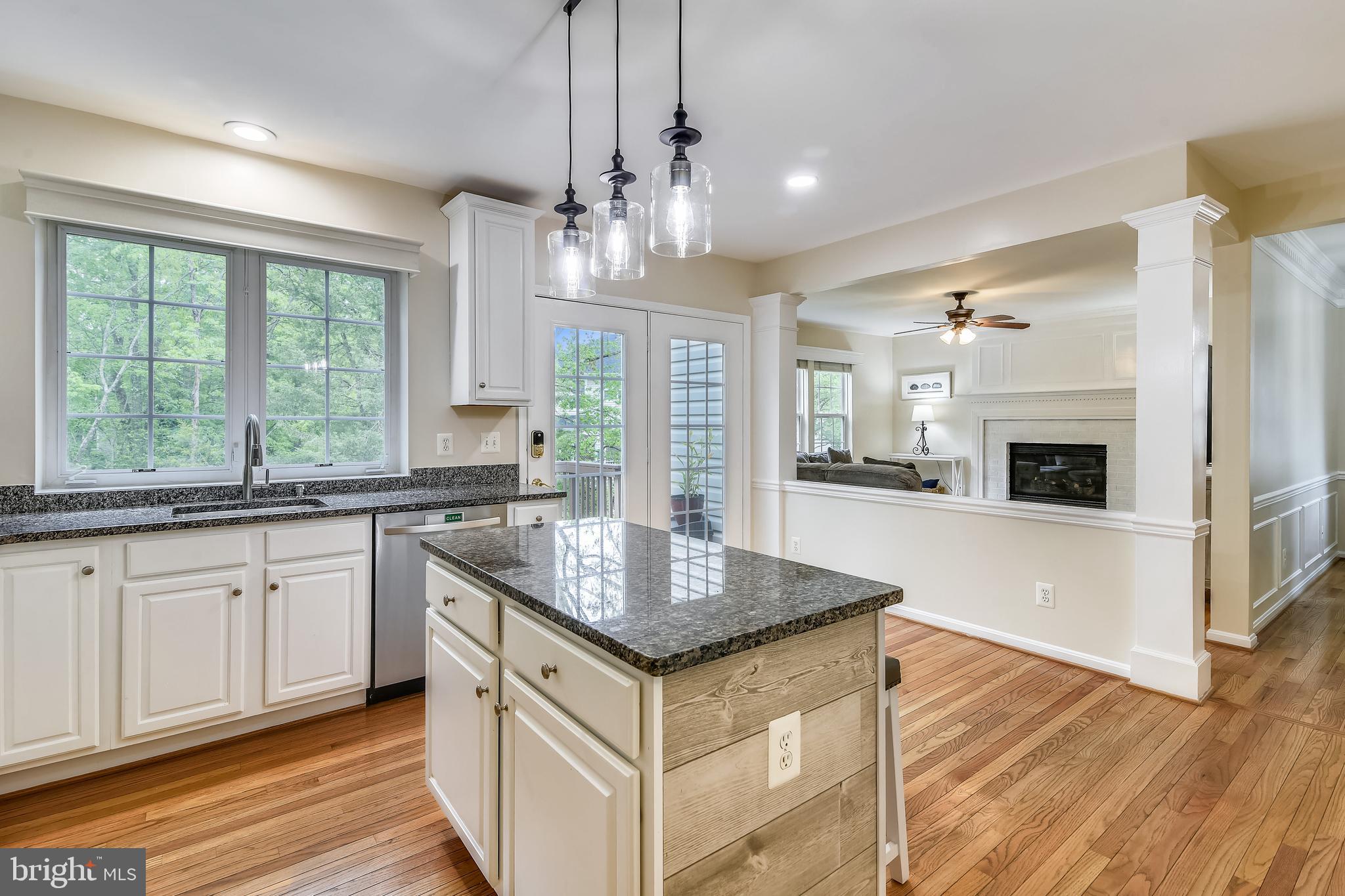 21558 Awbrey Place Broadlands, VA 20148 - Photo 11 of 45 CENTER ISLAND WITH PENDANT LIGHTS + GRANITE