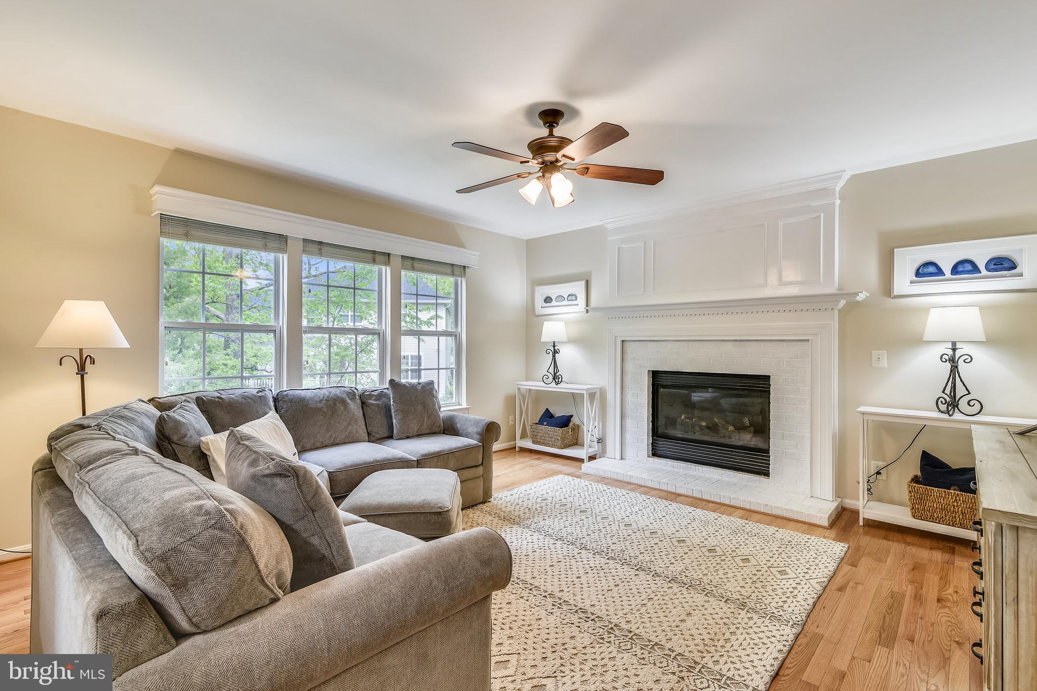 21558 Awbrey Place Broadlands, VA 20148 - Photo 13 of 45 SPACIOUS FAMILY ROOM WITH GAS FIREPLACE + MANTLE