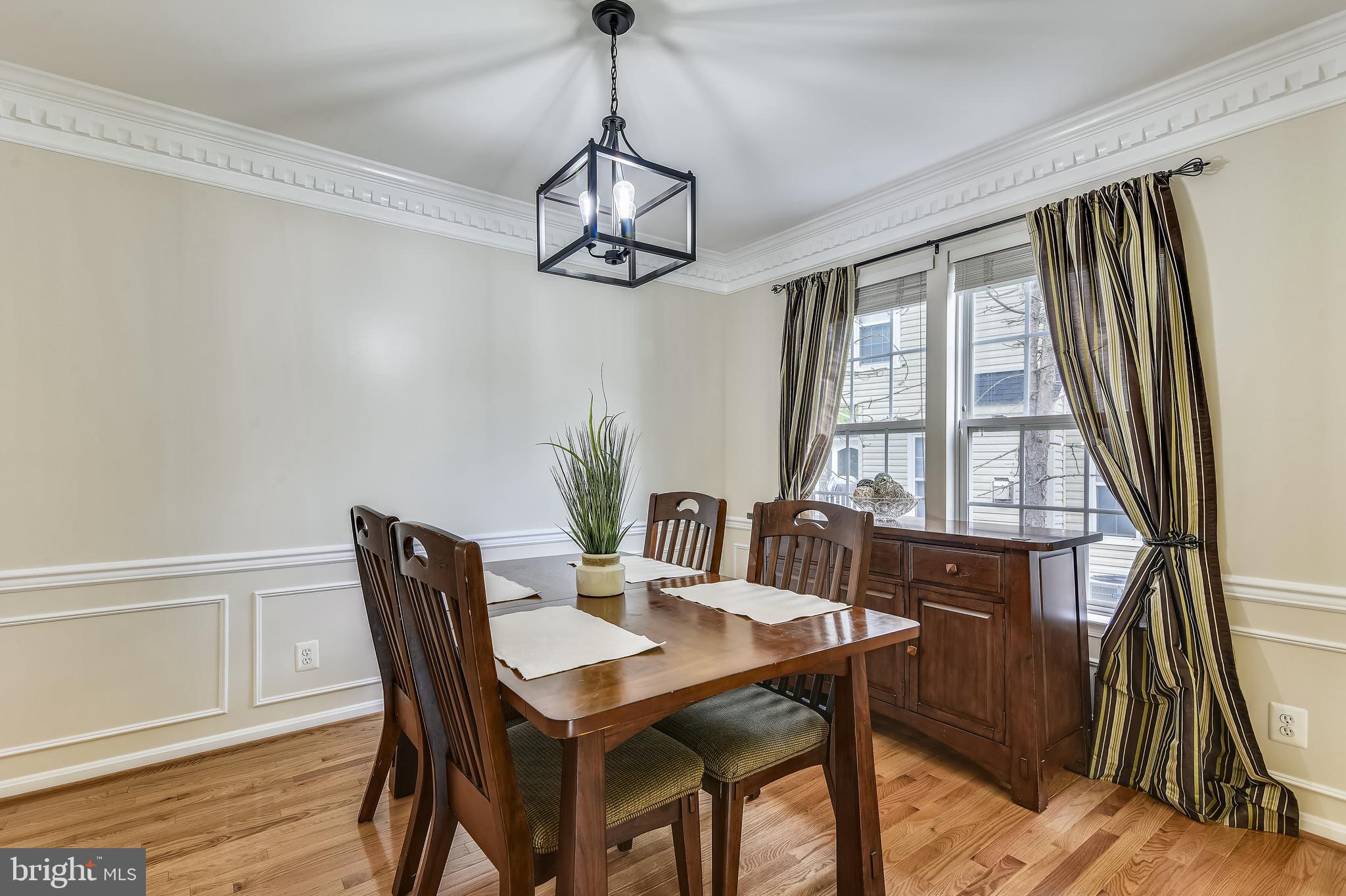 21558 Awbrey Place Broadlands, VA 20148 - Photo 17 of 45 FORMAL DINING ROOM WITH UPDATED LIGHTING
