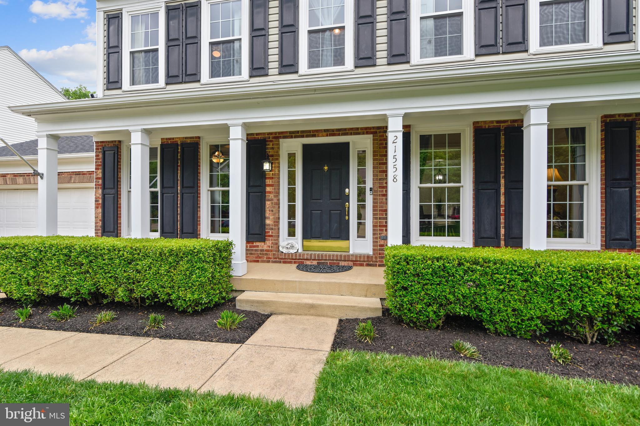 21558 Awbrey Place Broadlands, VA 20148 - Photo 3 of 45 INVITING FRONT PORCH TO WELCOME GUESTS