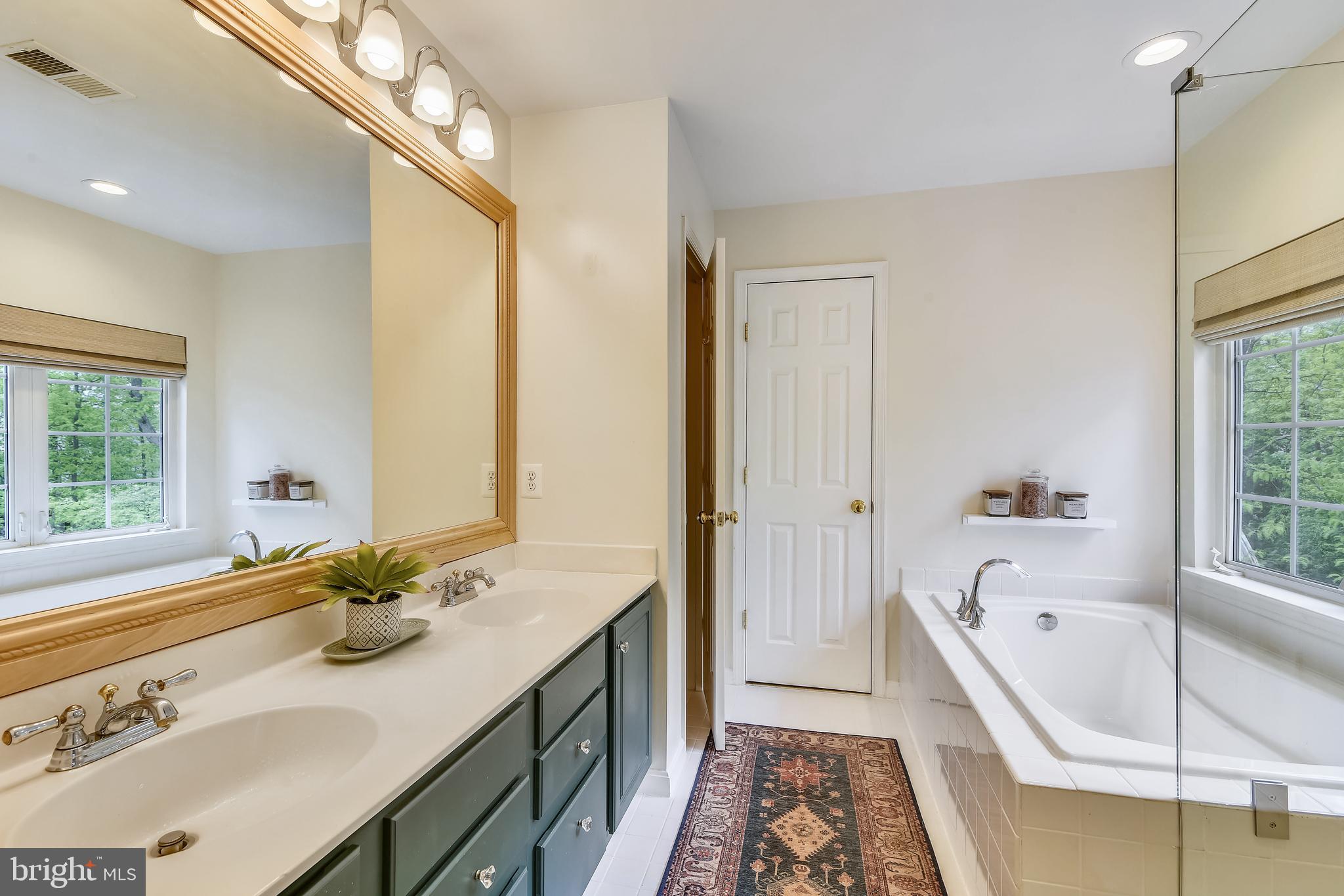 21558 Awbrey Place Broadlands, VA 20148 - Photo 25 of 45 UPDATED OWNER'S BATH WITH DOUBLE BOWL VANITY