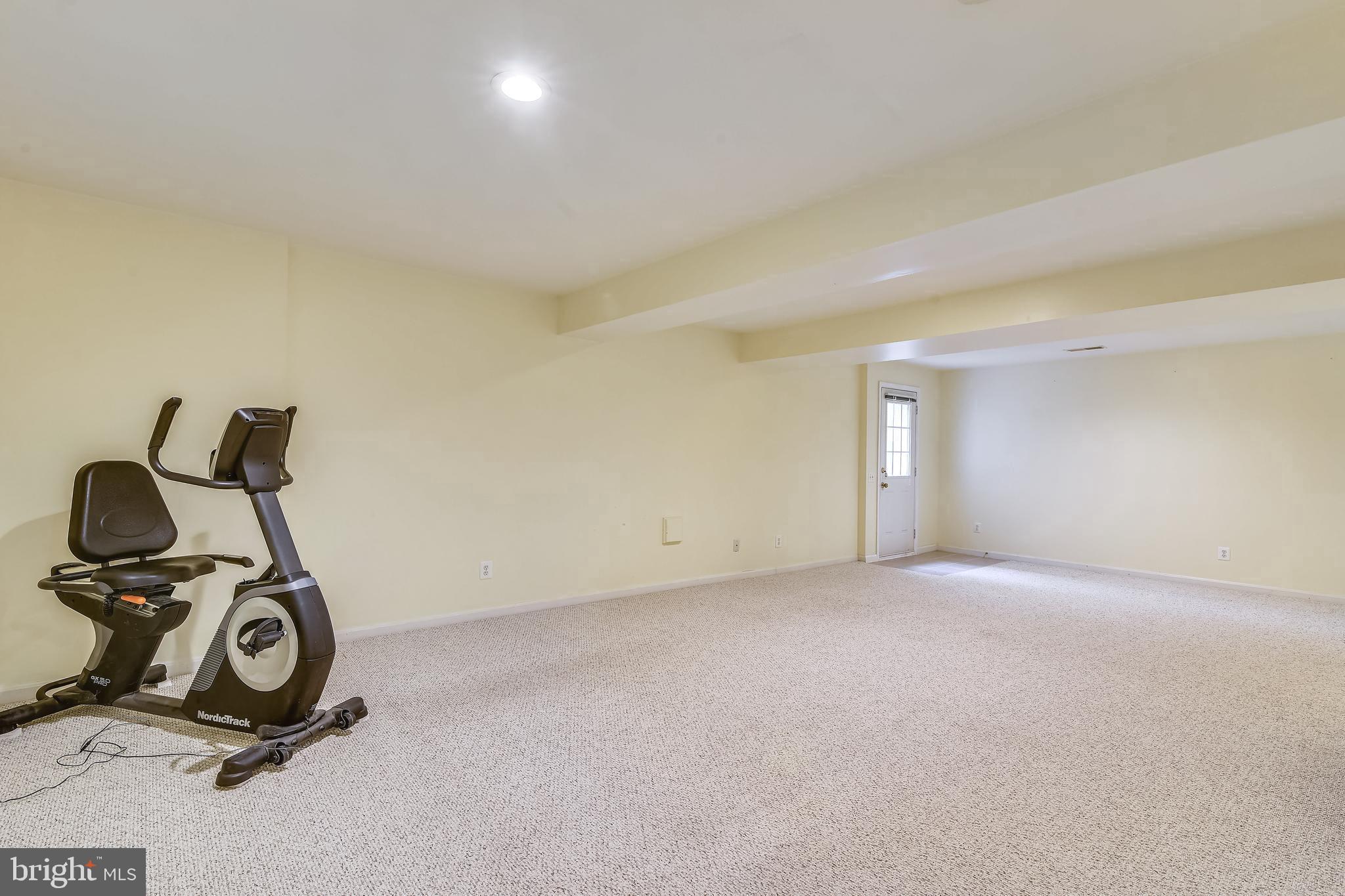 21558 Awbrey Place Broadlands, VA 20148 - Photo 34 of 45 WALK-UP FINISHED LOWER LEVEL LARGE STORAGE ROOM