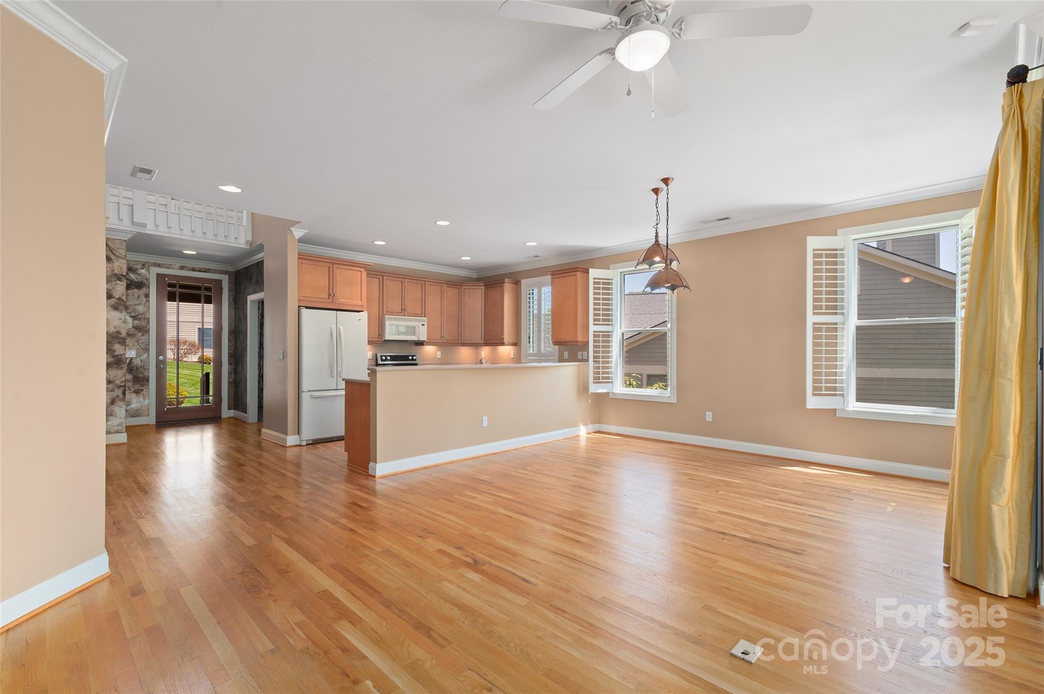 111 Augusta Circle Waynesville, NC 28786 - Photo 12 of 41 a view of a kitchen with wooden floor and a window