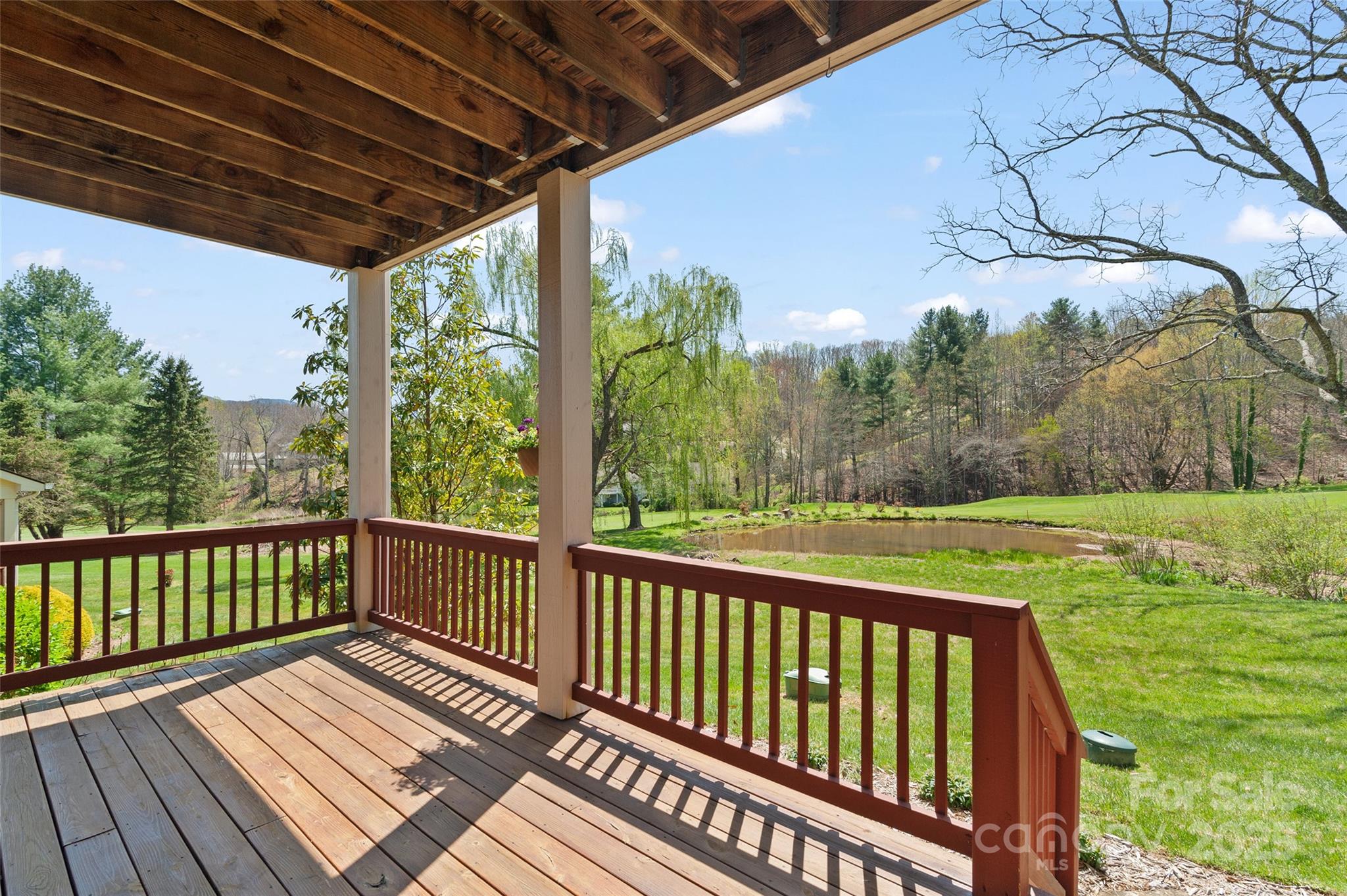 111 Augusta Circle Waynesville, NC 28786 - Photo 19 of 41 a view of a wooden deck