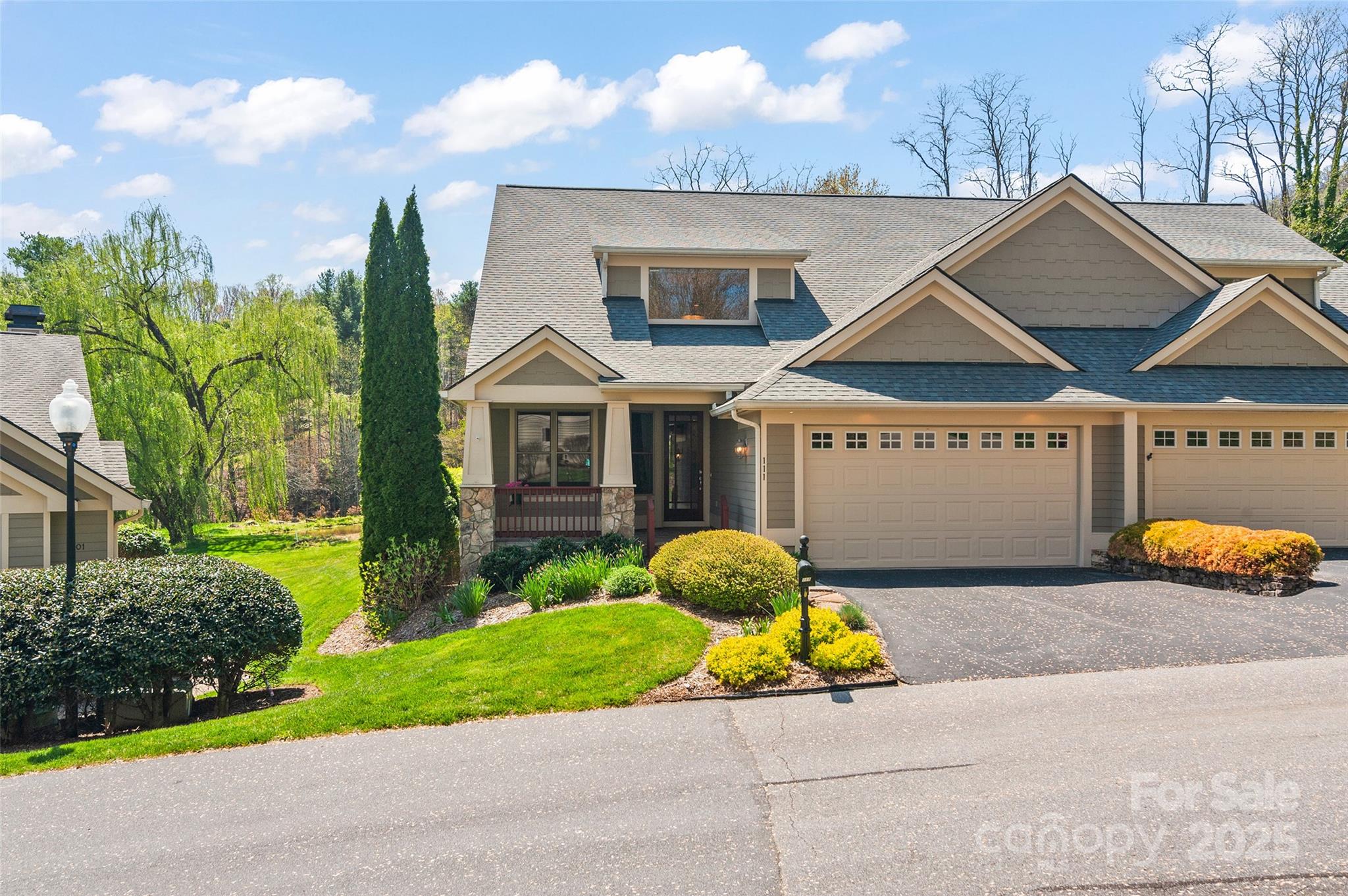 111 Augusta Circle Waynesville, NC 28786 - Photo 2 of 41 a front view of a house with garden