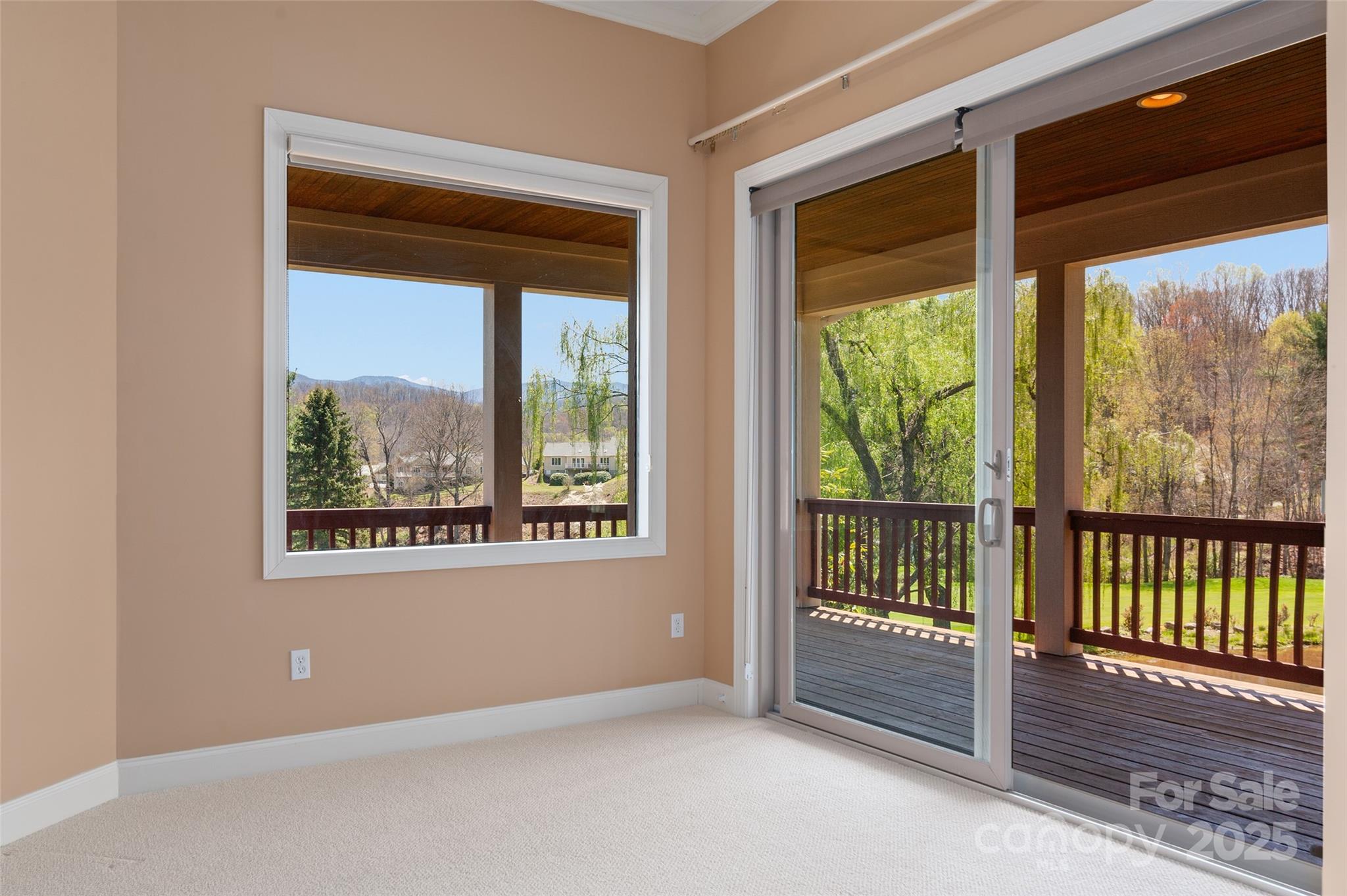 111 Augusta Circle Waynesville, NC 28786 - Photo 26 of 41 a view of an empty room with a window