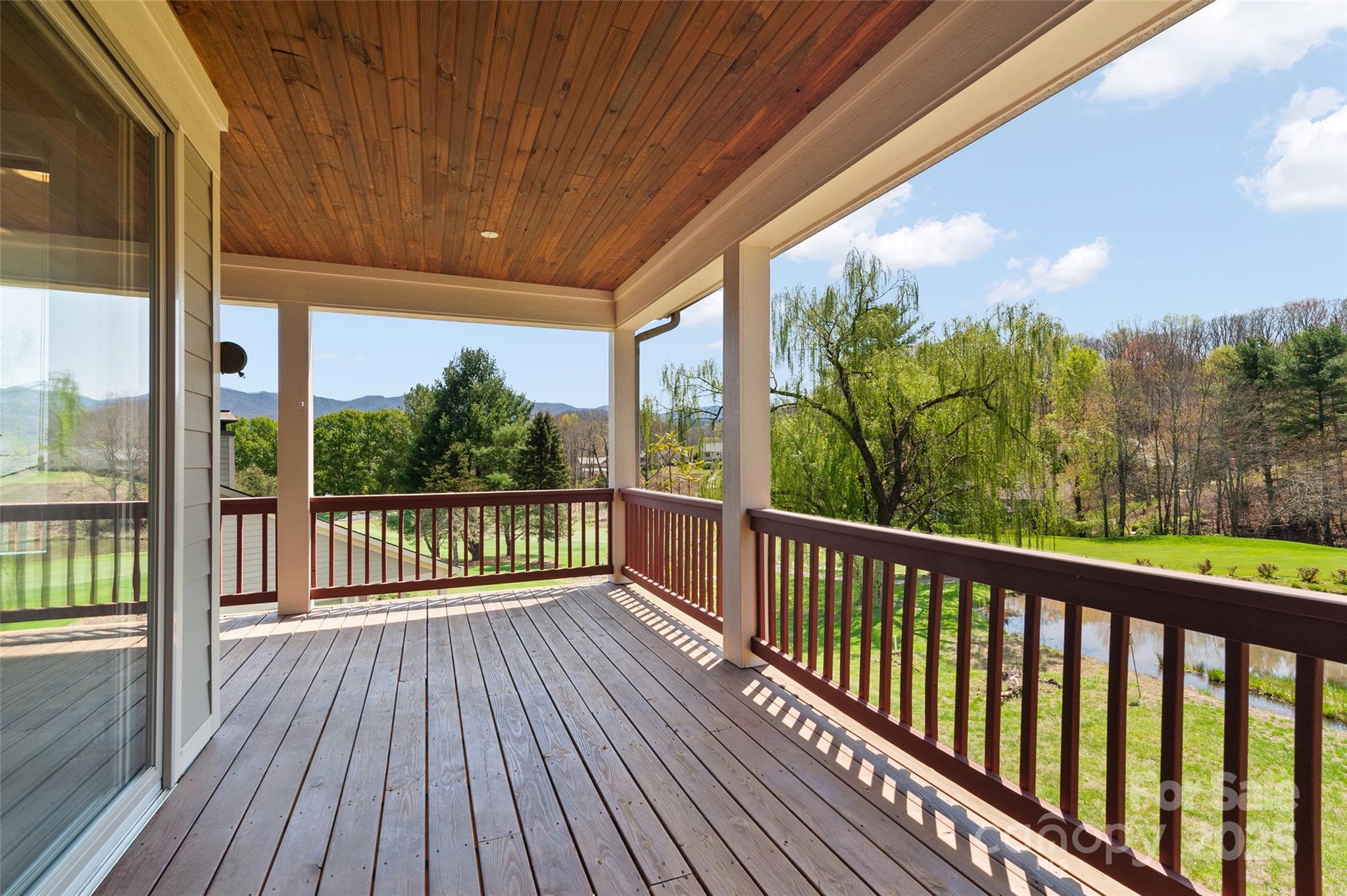 111 Augusta Circle Waynesville, NC 28786 - Photo 27 of 41 a view of a balcony with wooden floor