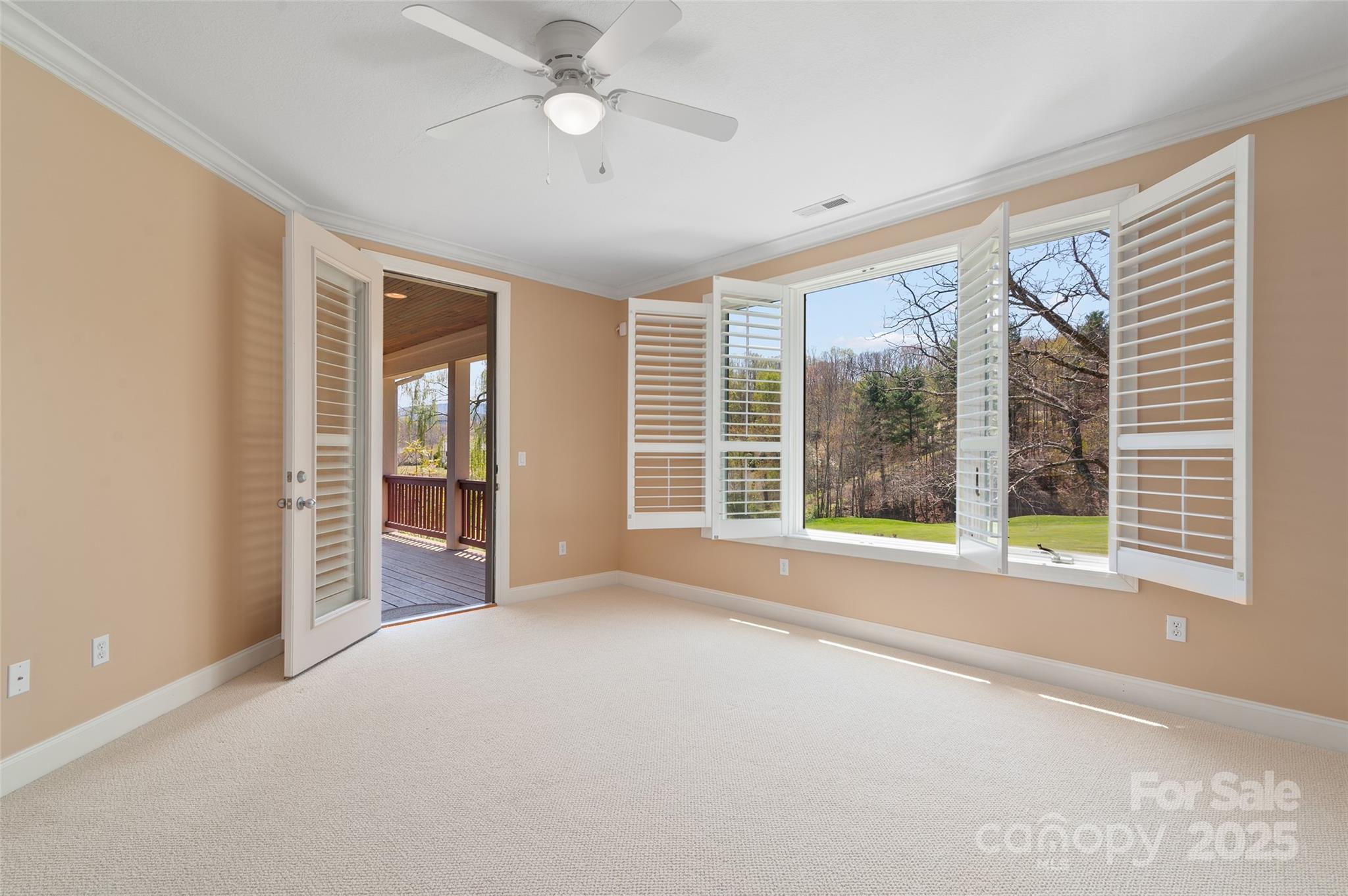 111 Augusta Circle Waynesville, NC 28786 - Photo 28 of 41 a view of an empty room with a window