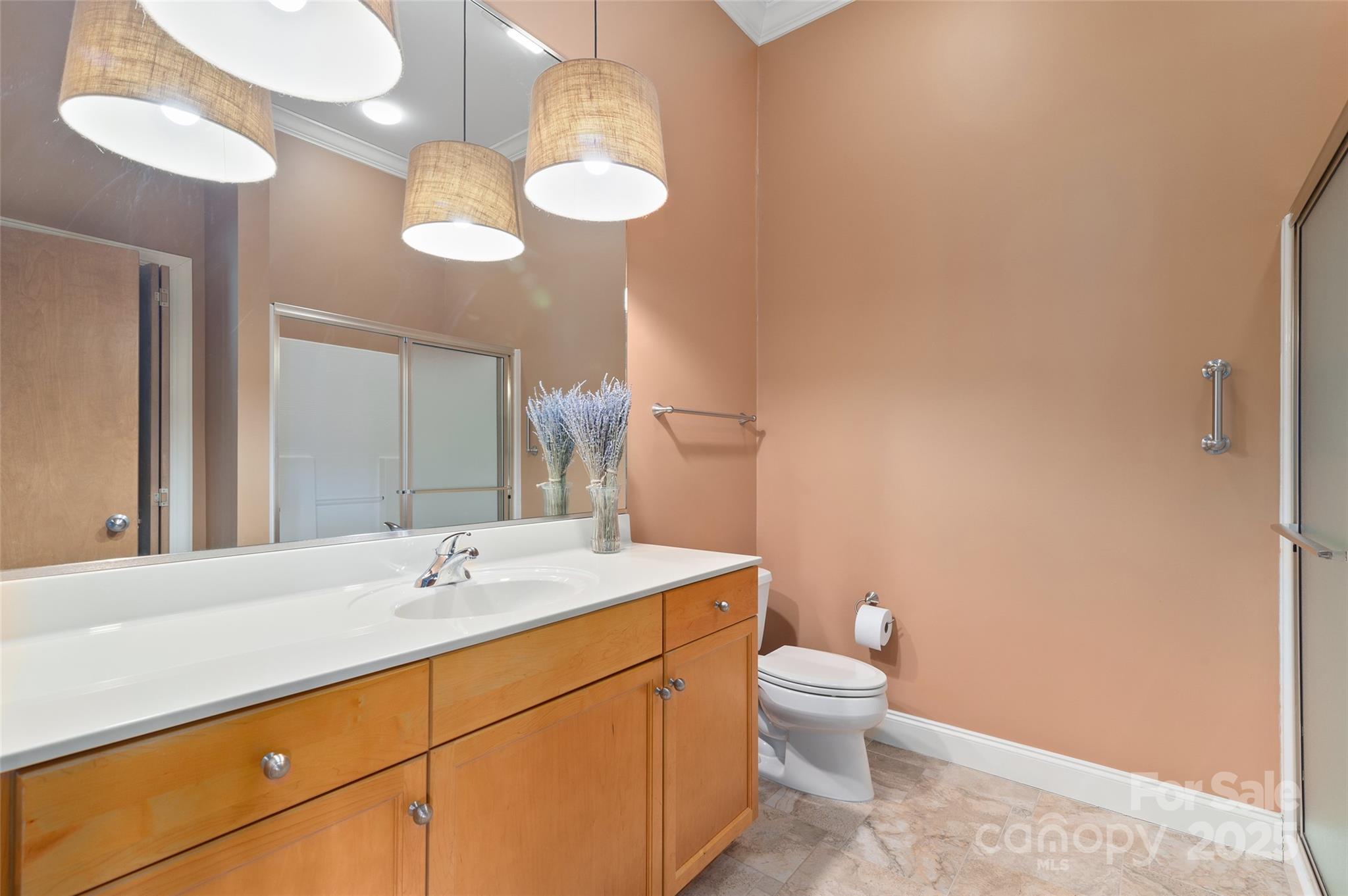 111 Augusta Circle Waynesville, NC 28786 - Photo 30 of 41 a bathroom with a double vanity sink mirror and toilet