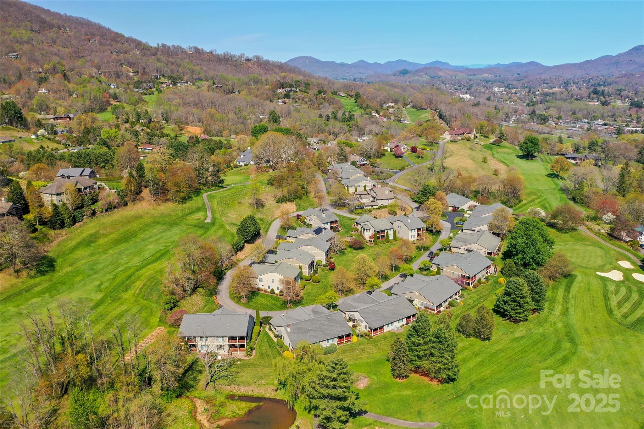 111 Augusta Circle Waynesville, NC 28786 - Photo 37 of 41 a view of a city with mountains in the background