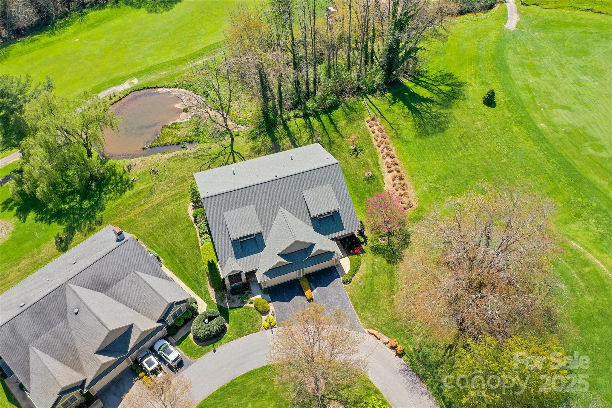 111 Augusta Circle Waynesville, NC 28786 - Photo 39 of 41 an aerial view of a house with a yard and swimming pool