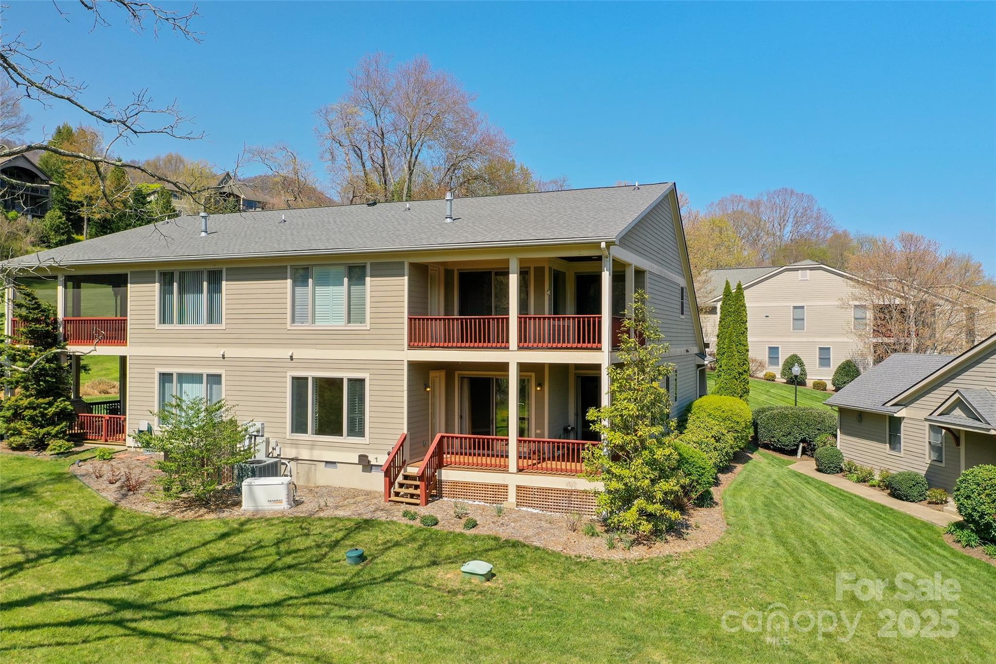 111 Augusta Circle Waynesville, NC 28786 - Photo 4 of 41 a view of a house with a yard porch and sitting area
